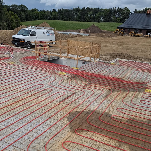 Radiant floor heating installation by Monticello Plumbing, Heating, and Air.